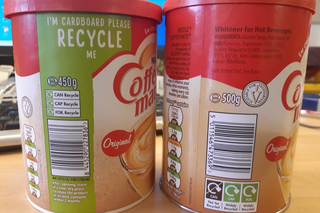 Two canisters of powdered coffee creamer turned to show their ingredient panels